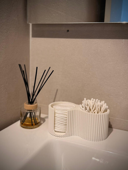 Dispensador de bastoncillos y discos de algodón